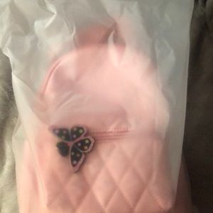 Brand new still in bag backpack with charm